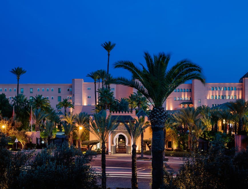 alan keohane morocco mamounia hotel marrakech north entrance facade summer palm tree tree building housing villa resort city hacienda