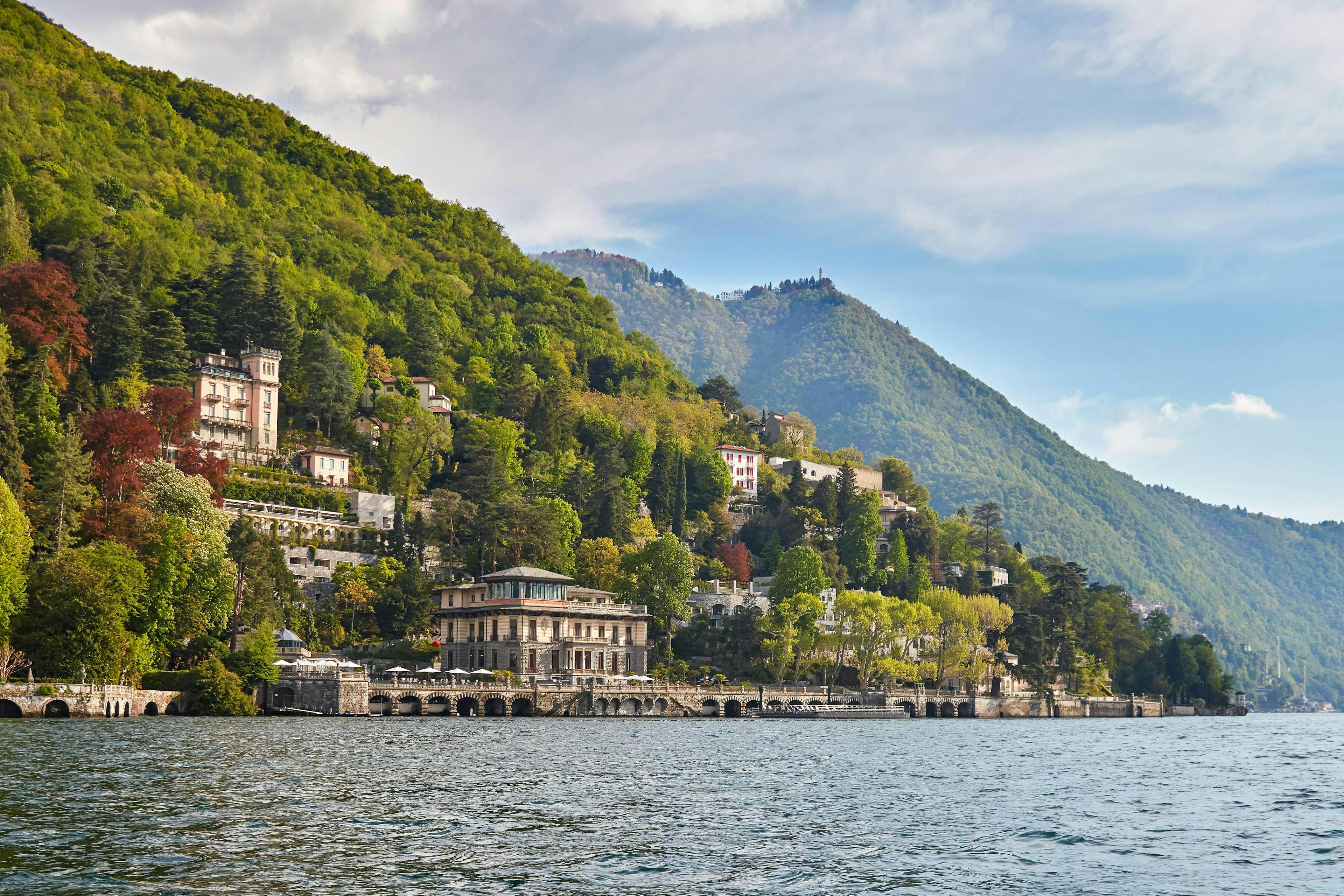 emea lake como nature outdoors scenery water waterfront lake fir tree promontory building