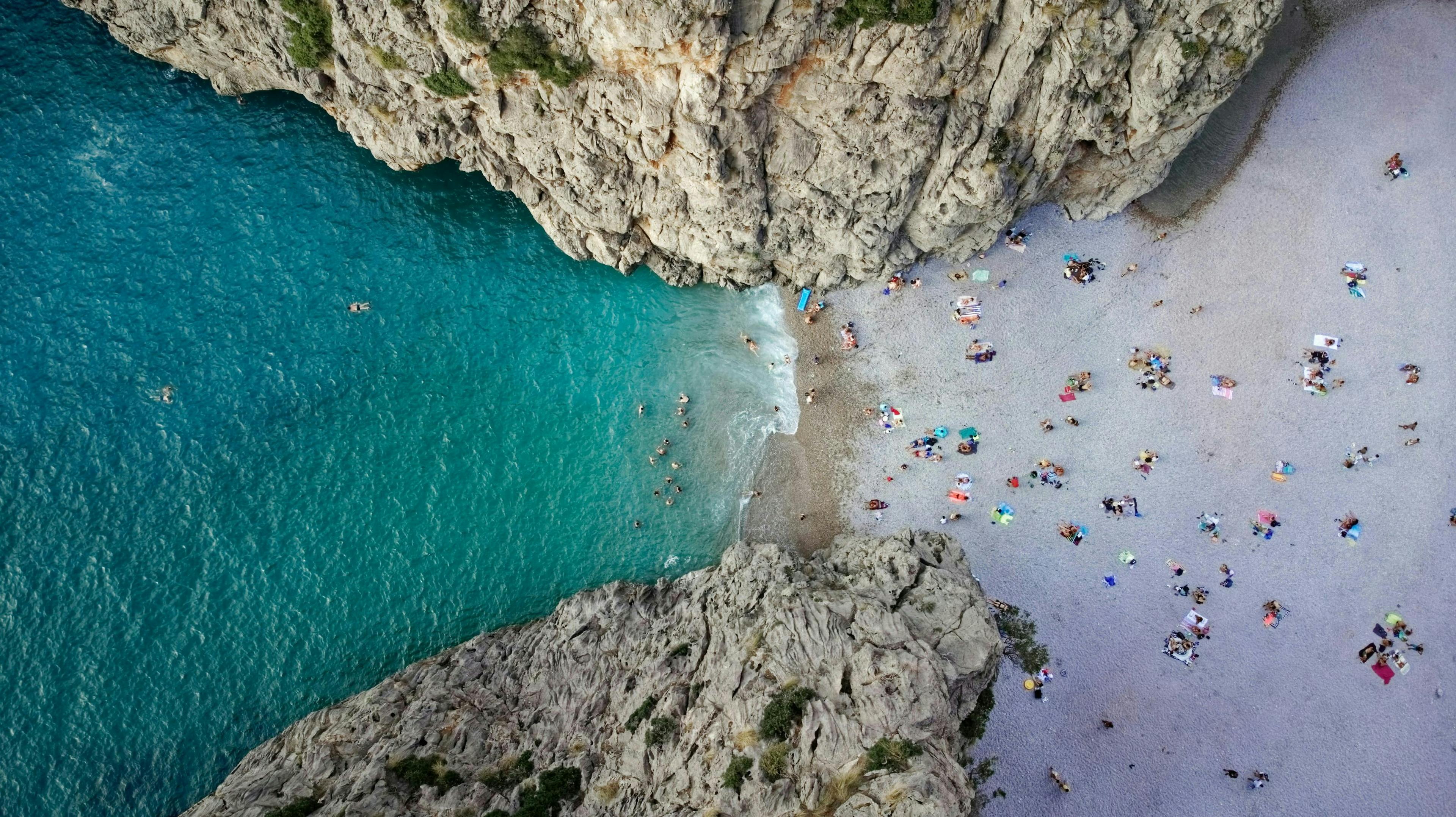 nature outdoors sea water coast shoreline cliff beach aerial view promontory